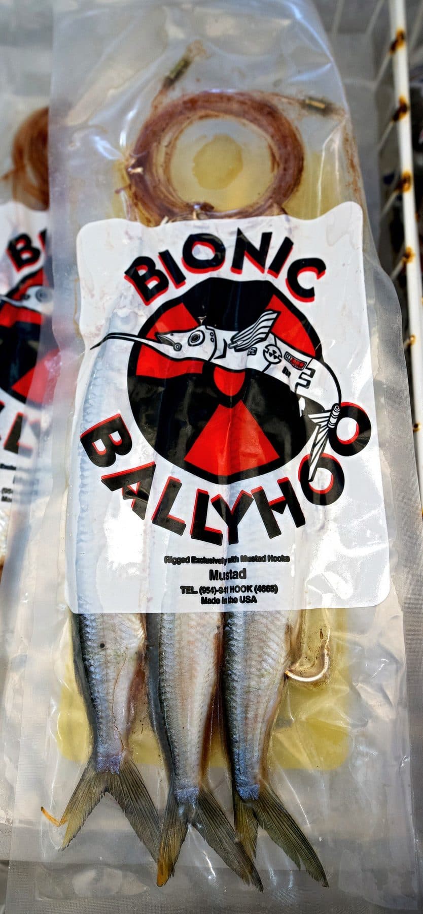 Bionic Ballyhoo pack of three ballyhoo rigged with Mustad hooks and a coiled leader in a bait freezer