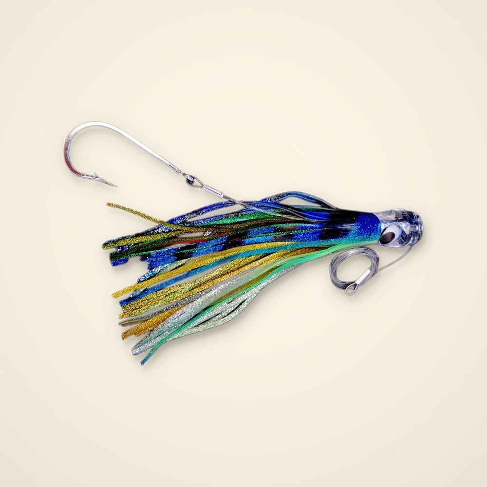 Rigged trolling skirt lure with a clear eyed head, blue, green, gold and silver glitter skirt, stainless hook and leader