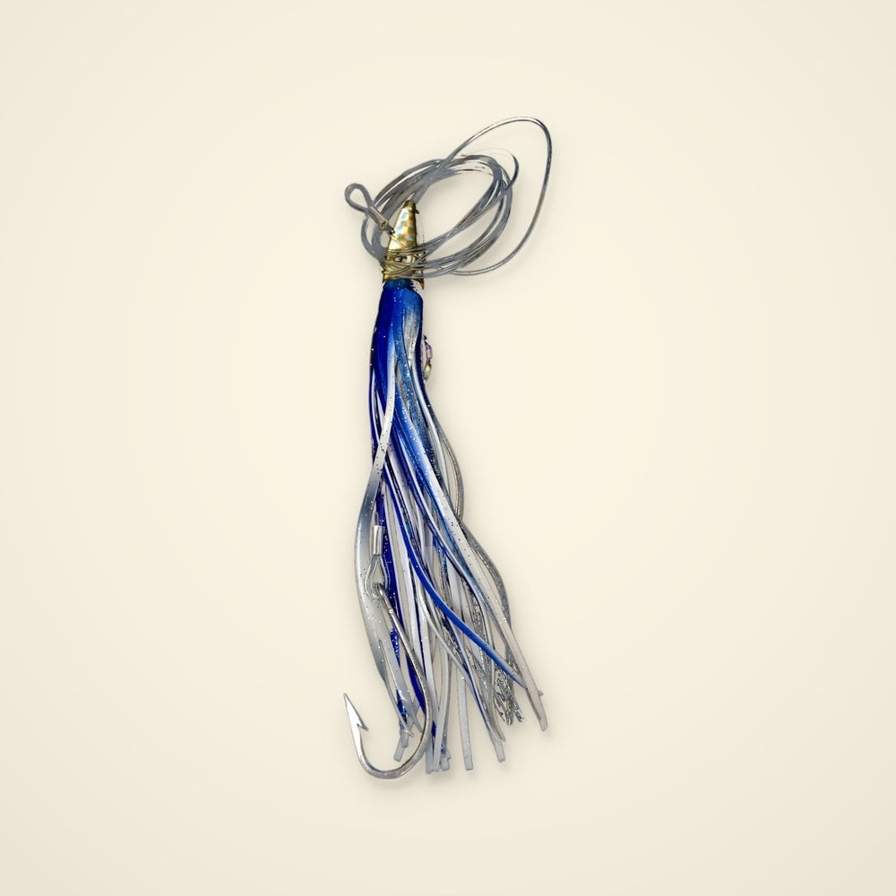 Blue and white rigged trolling skirt lure with a gold holographic head, clear leader coil and stainless hook