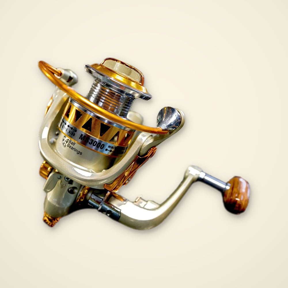 Champagne and gold MS3000 spinning reel with 4 ball bearings and a wood-look handle knob on a light background