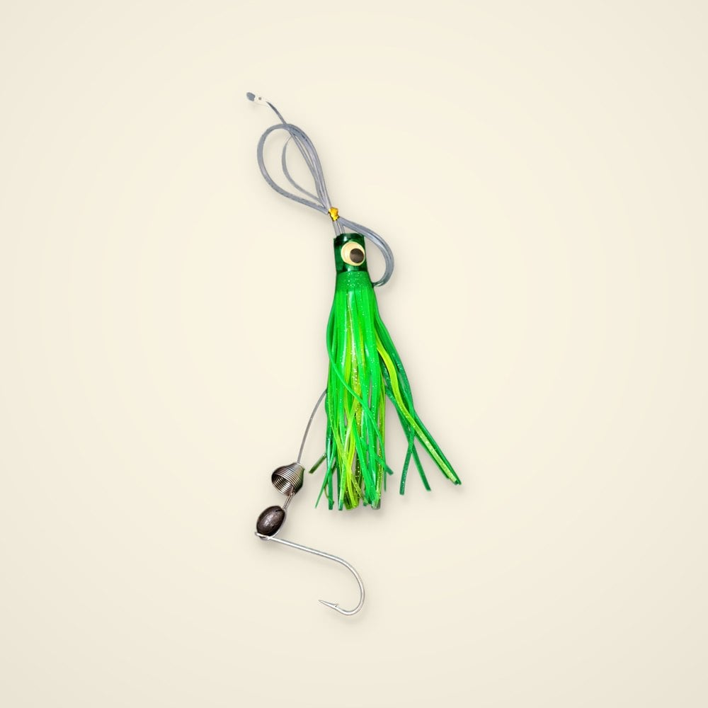 Green and chartreuse doll eye trolling skirt rigged with a bait spring, egg sinker and hook