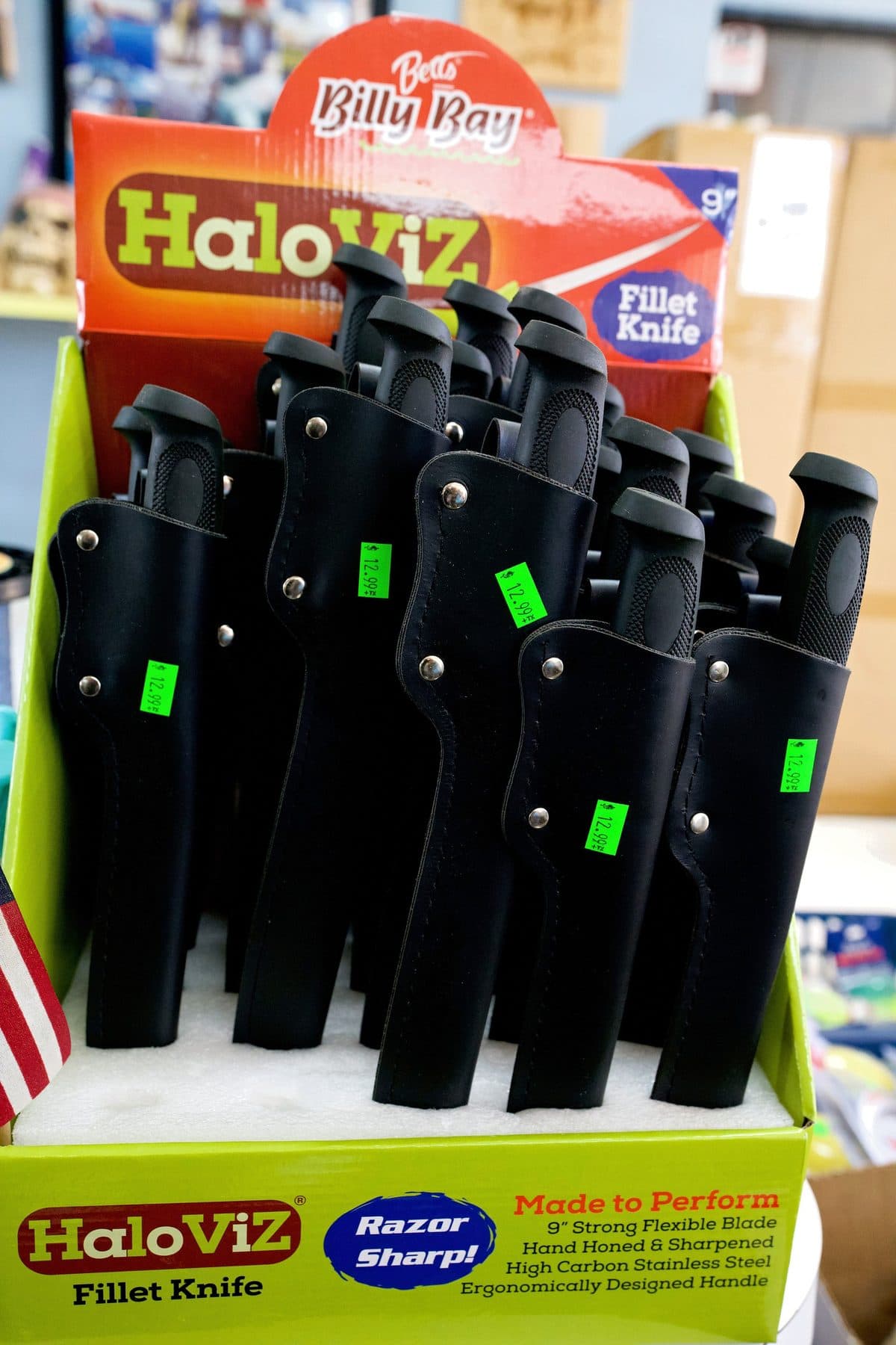 Counter display box of Betts Billy Bay HaloViZ 9 inch fillet knives in black sheaths