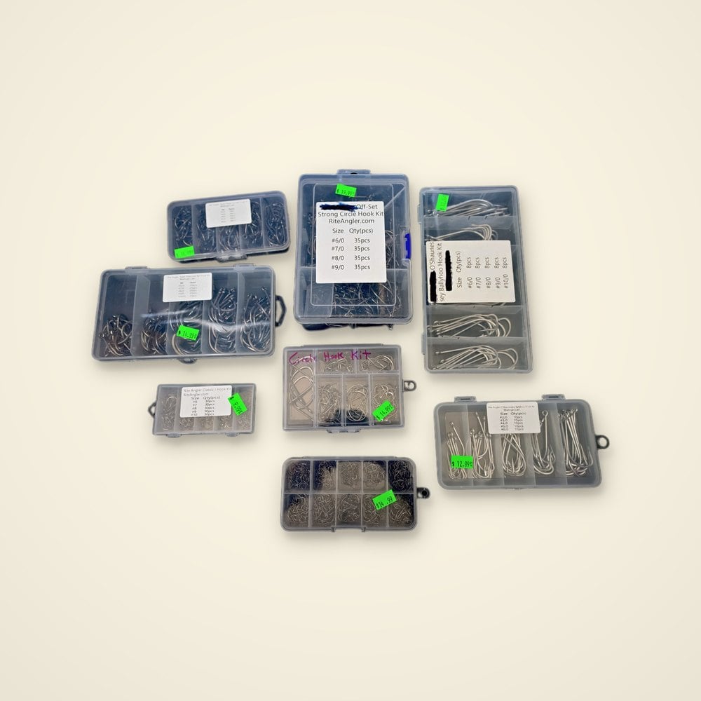 Eight clear hook kits including Rite Angler circle, J, live bait and ballyhoo assortments on a light background